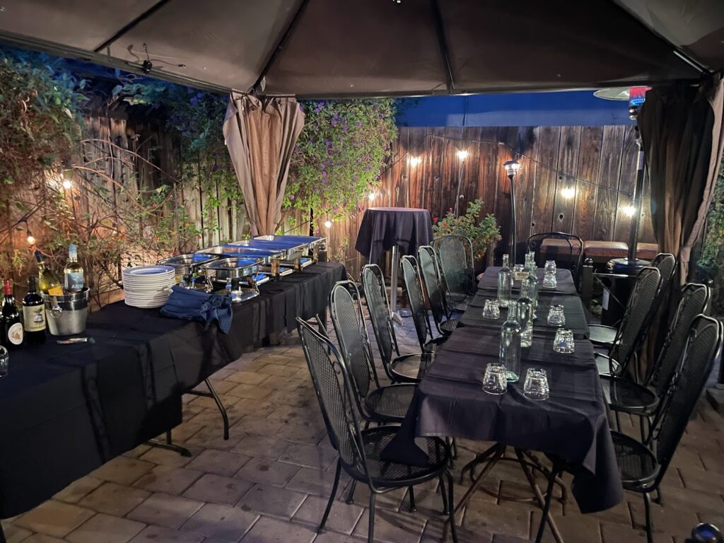 Our secret garden can accommodate up to 25 for sit-down dinner or mingling parties. 